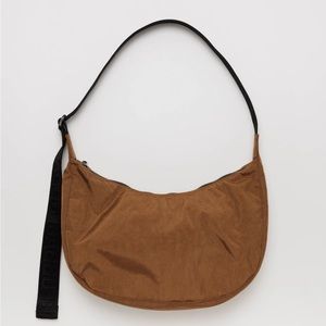 Medium Crescent Baggu Crossbody in the color Brown. Perfect condition, NWOT.